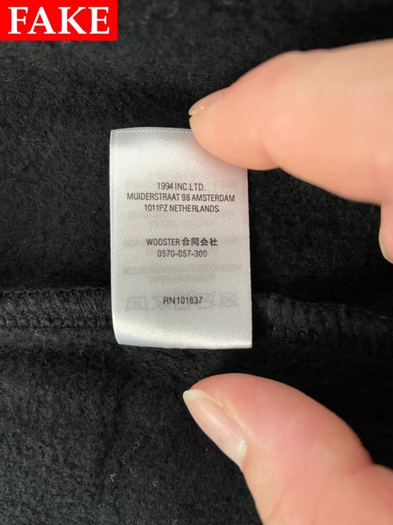 偽物のSupreme x Michael Jackson Dangerous Zip Up Hooded Sweatshirtの洗濯タグ（裏）