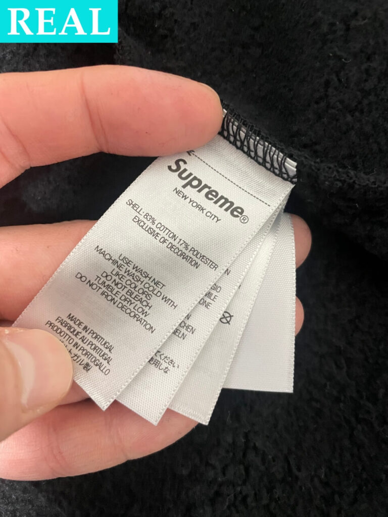 本物のSupreme x Michael Jackson Dangerous Zip Up Hooded Sweatshirtの洗濯タグ