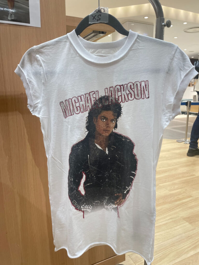 マイケル・ジャクソンのレディースTシャツ『BAD DIAMANTE / Amplified』ホワイト